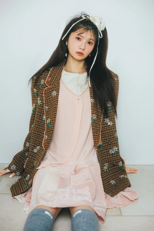 Woman in a blazer and dress