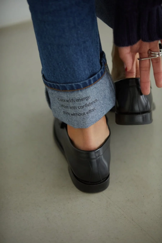 Rolled-up denim with message