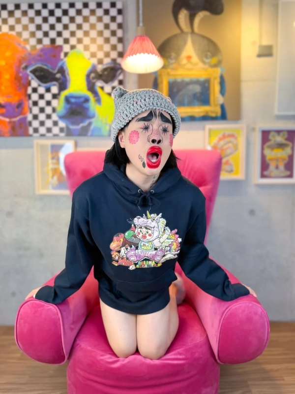 Briana Gigante kneeling in colorful attire