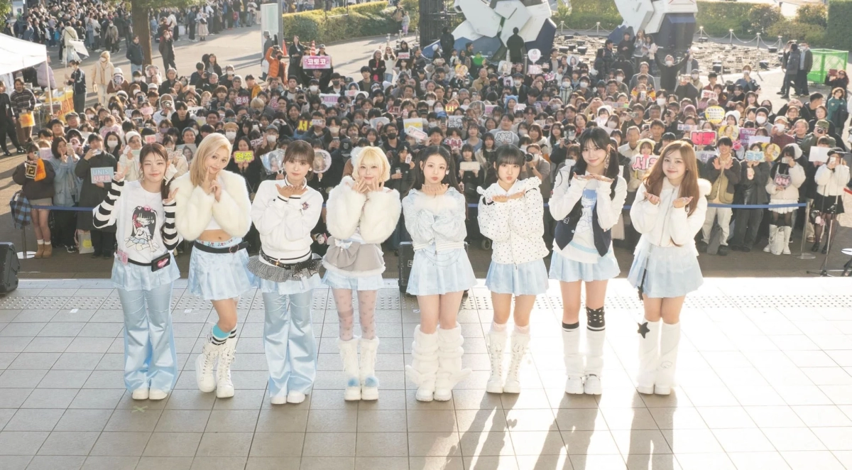 UNIS Members on Stage with Fans