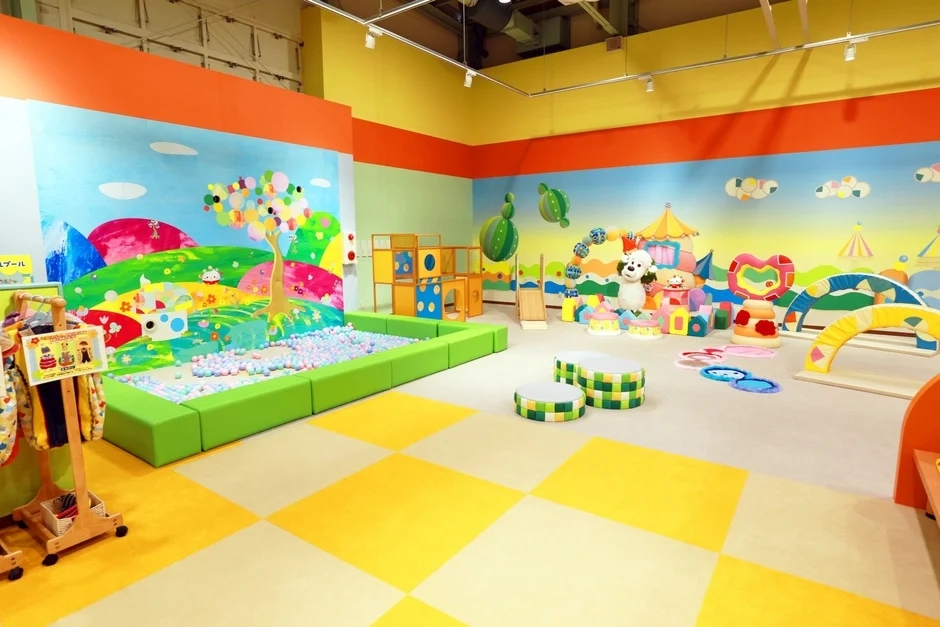 Kids playing in a colorful ball pit