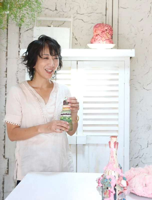 Artist Marimo Yoshida with her creations