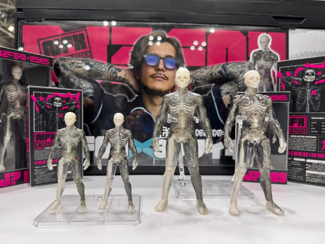 Multiple DJ Foy (Repezen Foxx) tattooed skeletal figures on display. Large DJ Foy poster in the background. NFX brand limited goods.