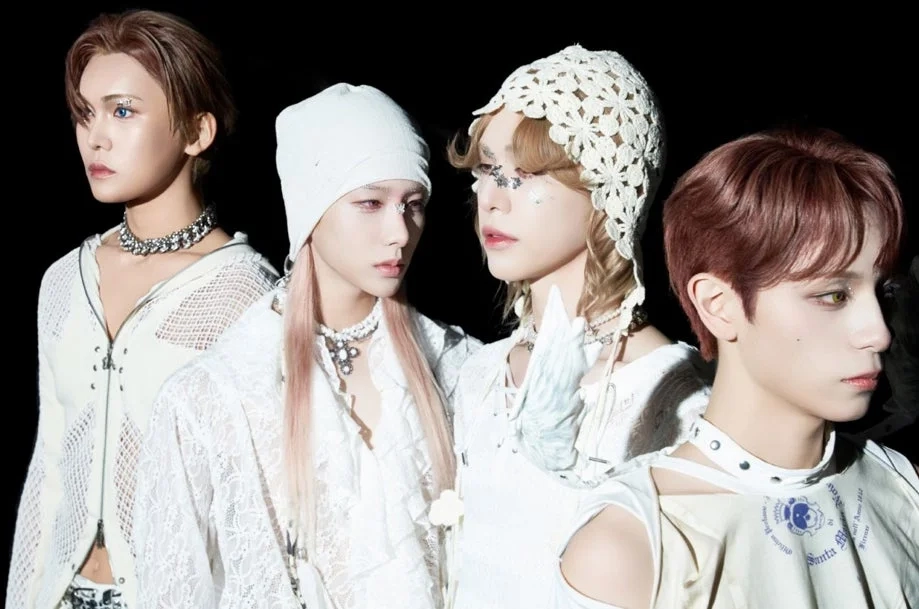 XLOV members in white outfits