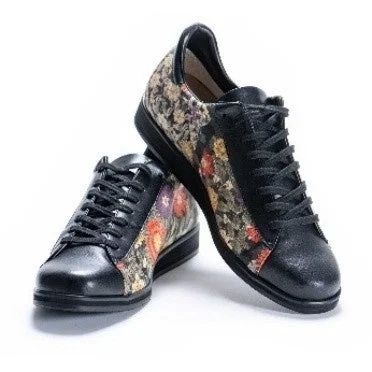 A pair of black patterned kimono sneakers