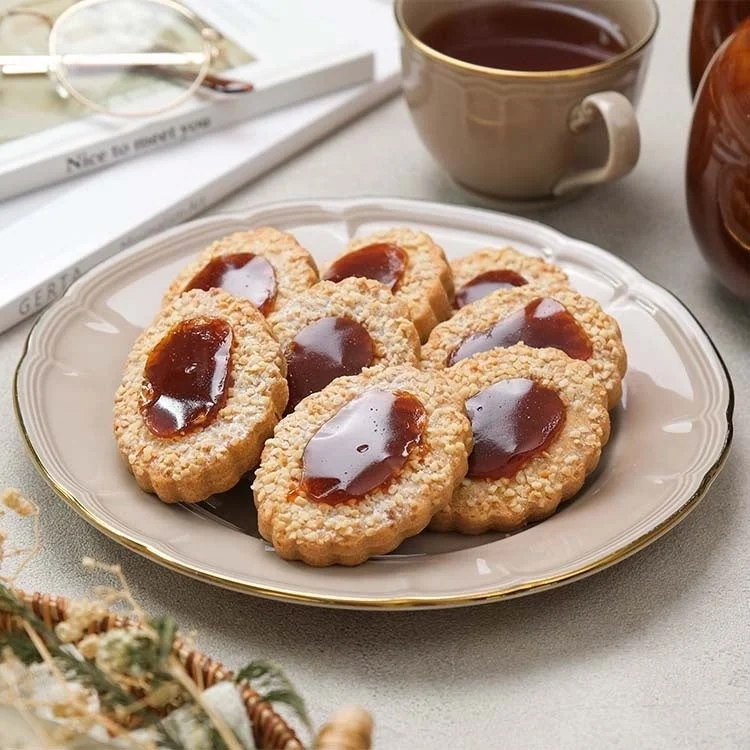 Cookies with tea, book, and glasses