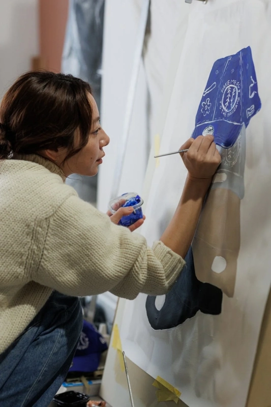 Artist working on canvas