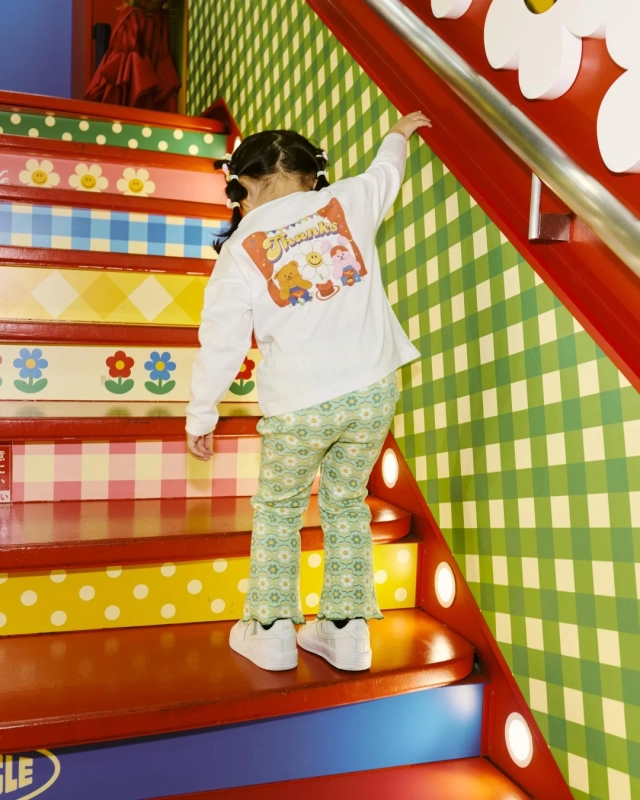 Child with Wiggle Wiggle backpack