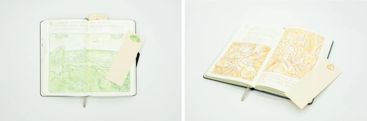 Notebook with landscape and character art