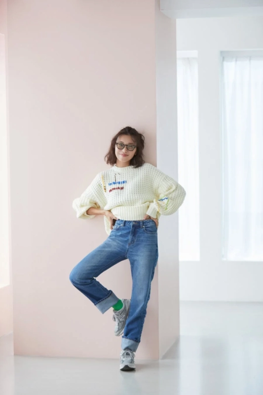 Woman in sweater and jeans