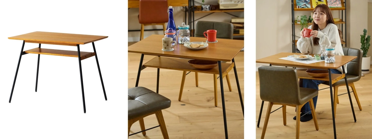 A small wooden dining table with a black metal frame and an under-table shelf.