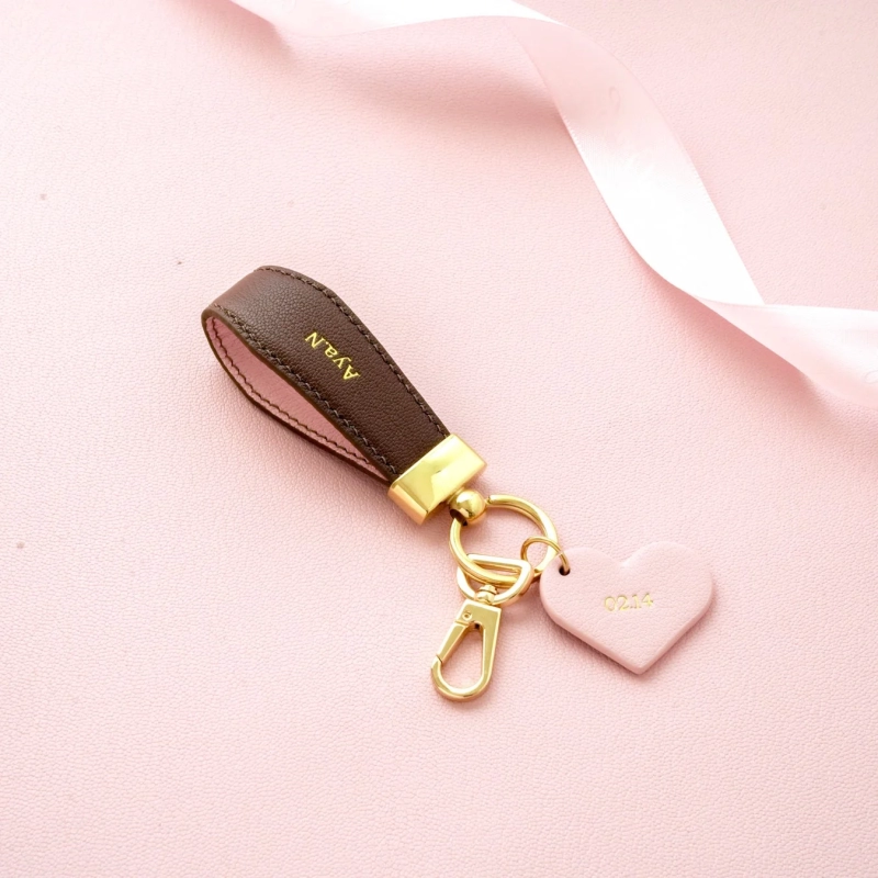 Brown leather keyholder, pink heart charm with date