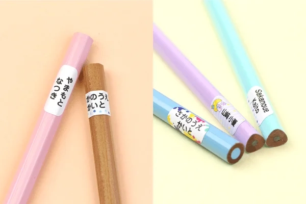 Various colored pencils with name seals