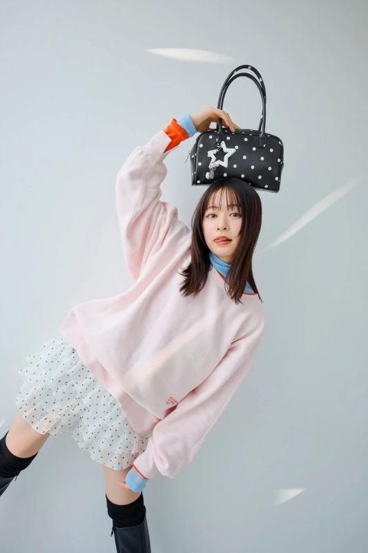 Pink hoodie with dot pattern bag