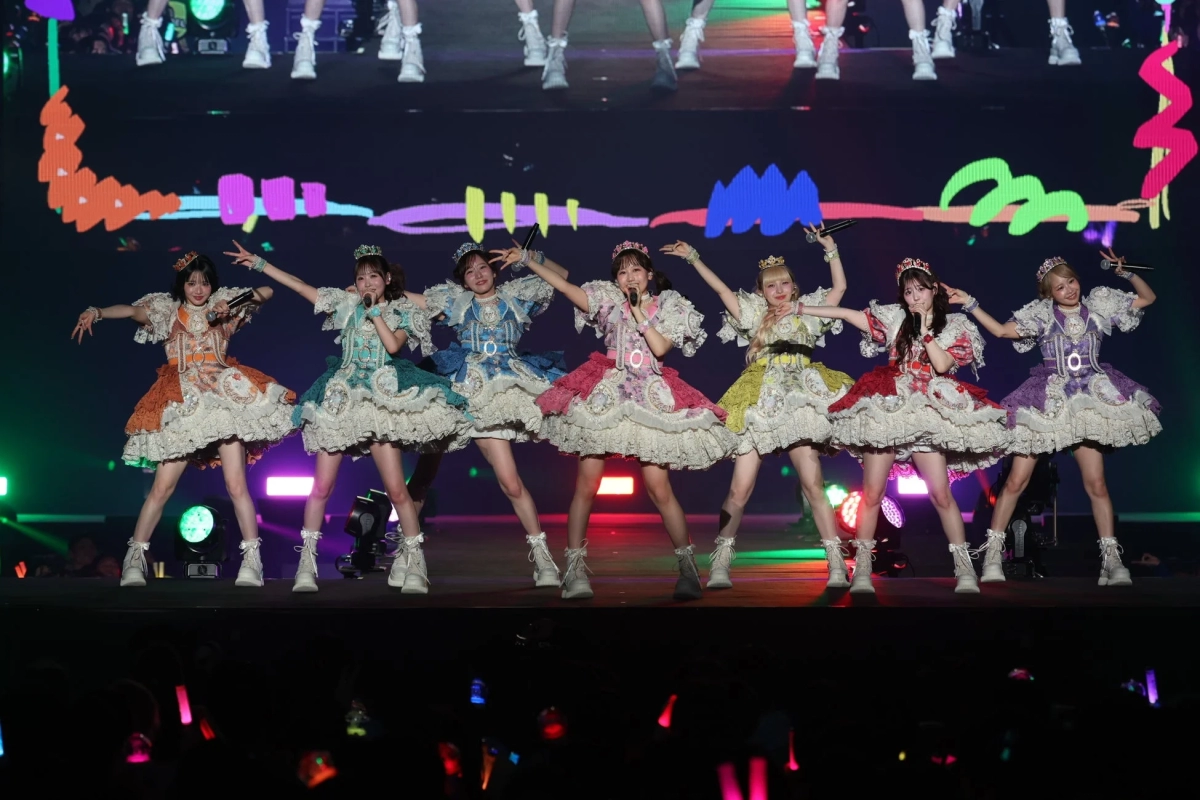FRUITS ZIPPER performing in colorful dresses