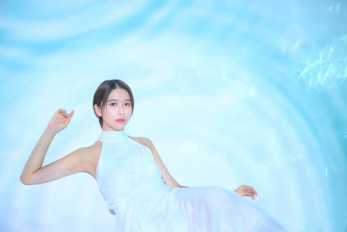 Shiori Tamai in a white dress