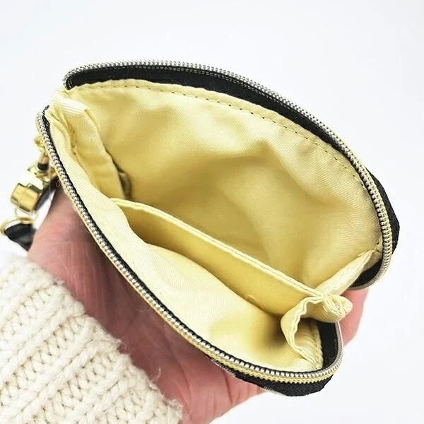 Inside view of pass case with coin compartment