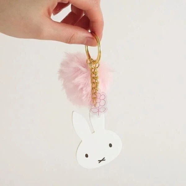 Hand holding Miffy Fur Keychain