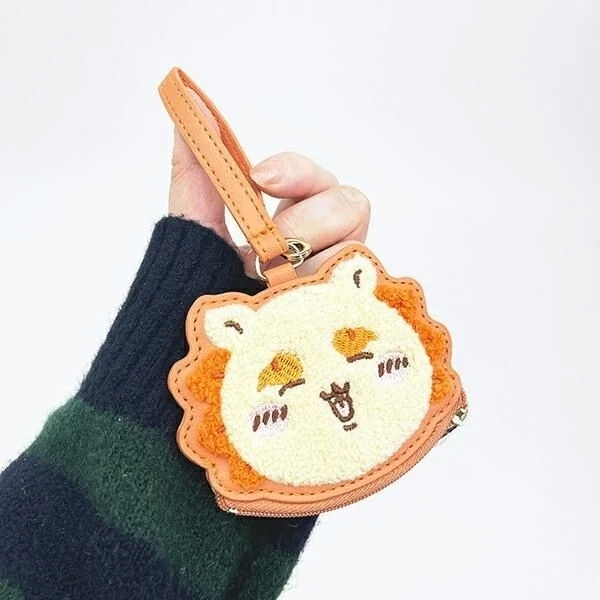 Mini pouch held in hand