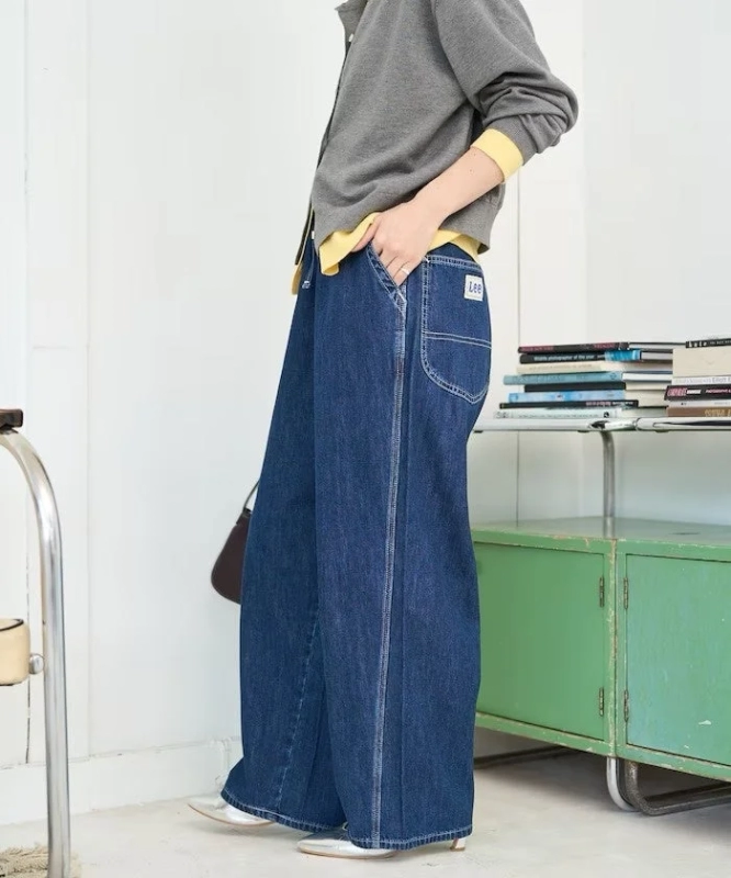 Female model in Lee wide-leg denim pants