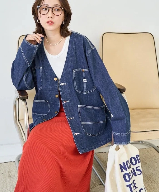 Female model in Lee V-neck denim jacket