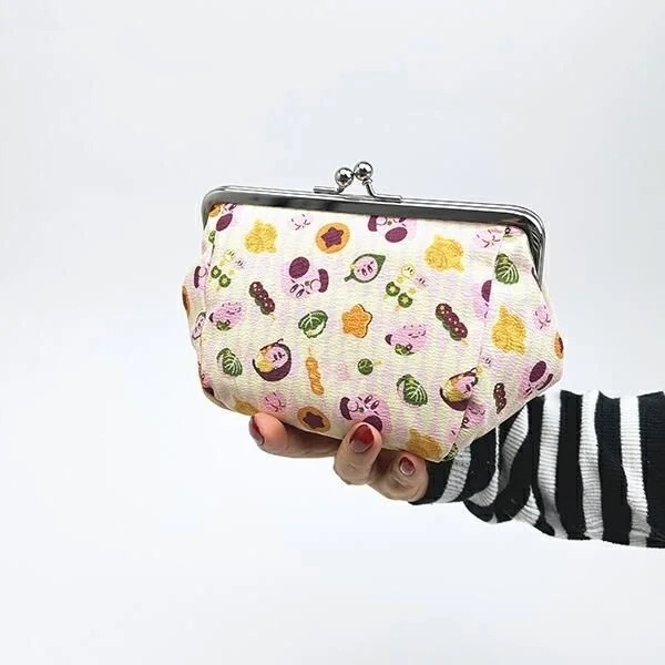 Kirby Gamaguchi Pouch Held