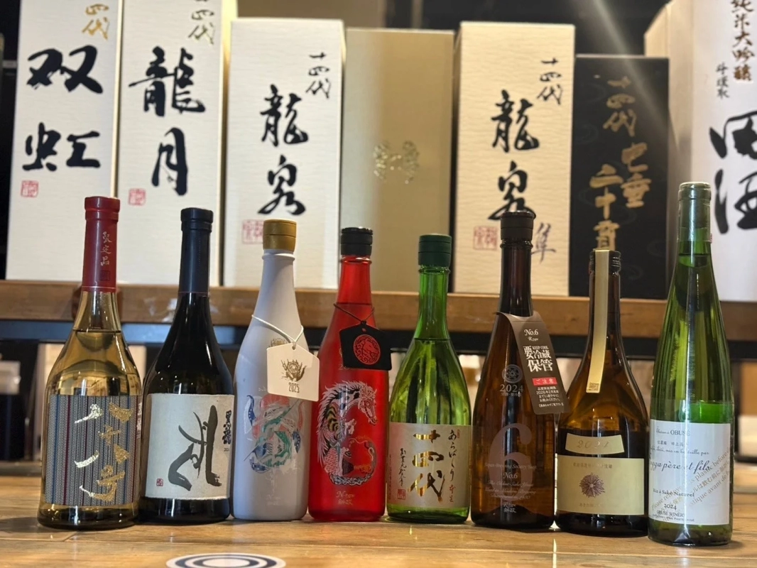 Assorted sake and wine bottles