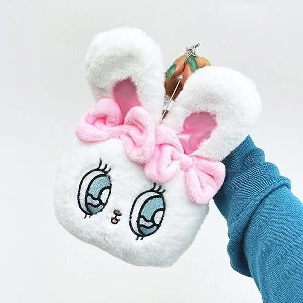 Esther Bunny Pass Case held in hand