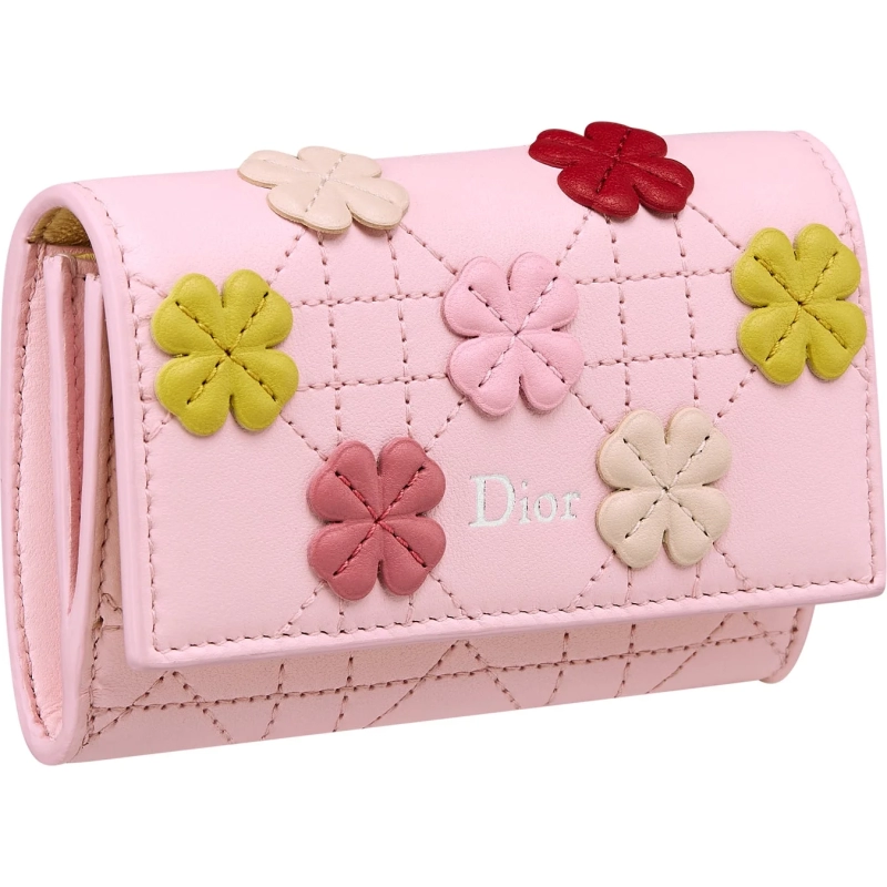Pastel pink quilted wallet with colorful clover motifs