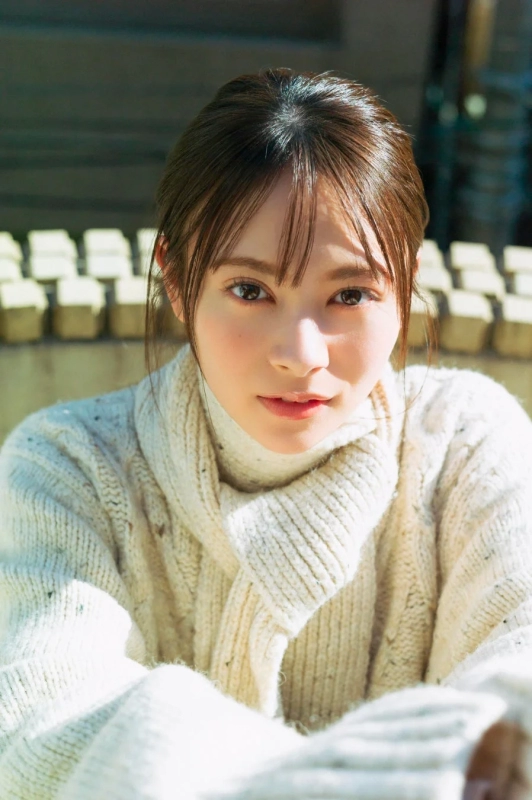 Momoka Ito in cream turtleneck
