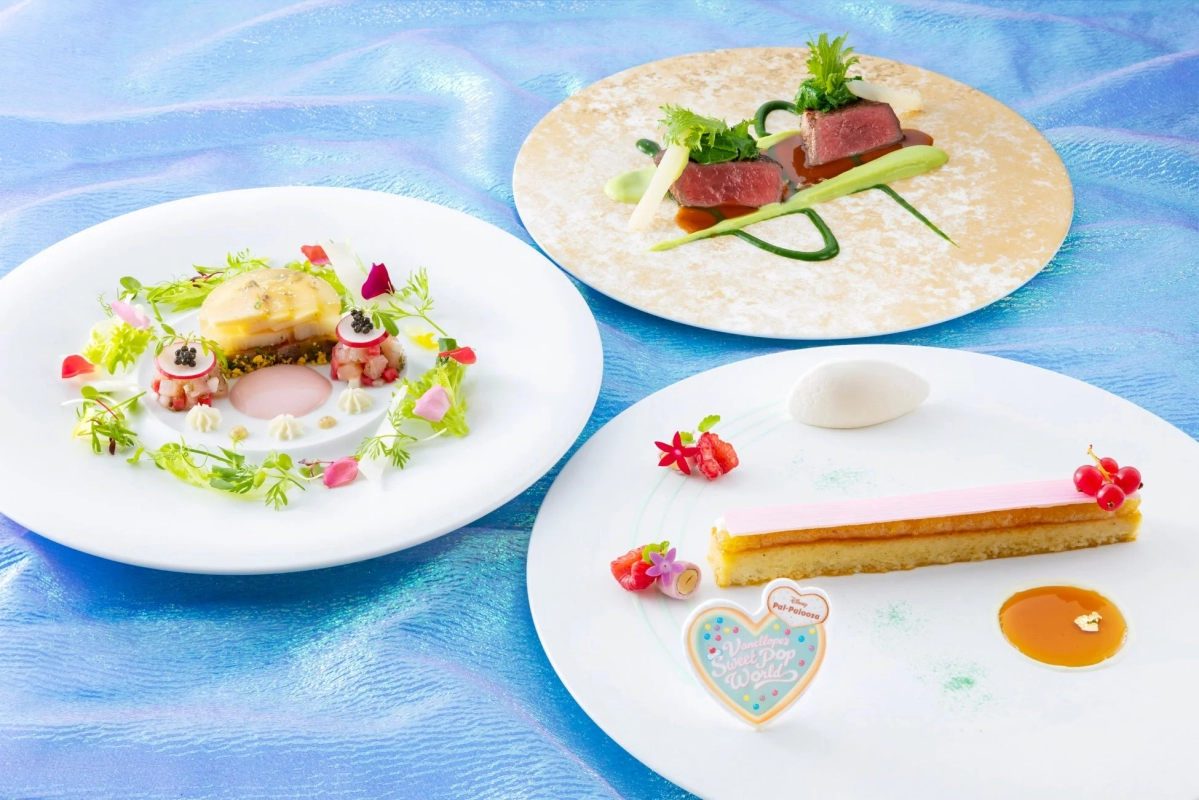 Elegant full course meal with a heart-shaped 'Vanellope's Sweet Pop World' decoration
