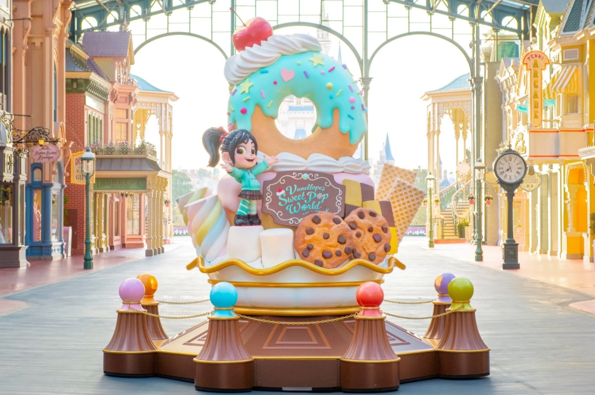 Street decorations with giant donuts and Vanellope at Disney Park