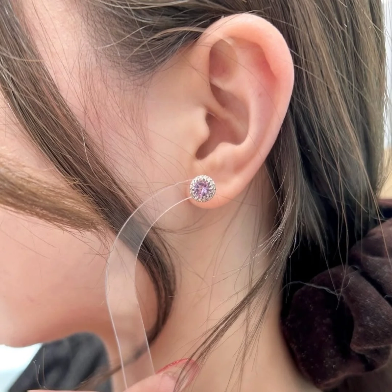 Earring with a pink gemstone