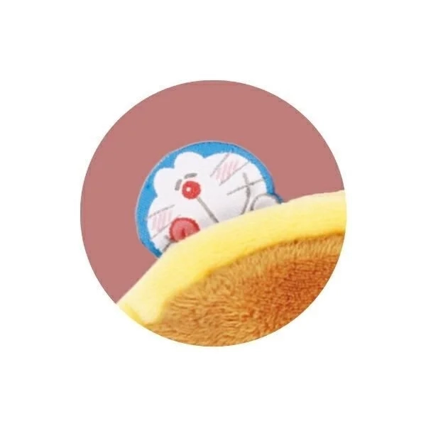 Close-up of Doraemon peeking from Dorayaki pouch
