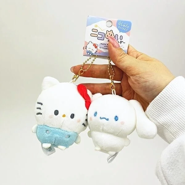 Hello Kitty and Cinnamoroll held together