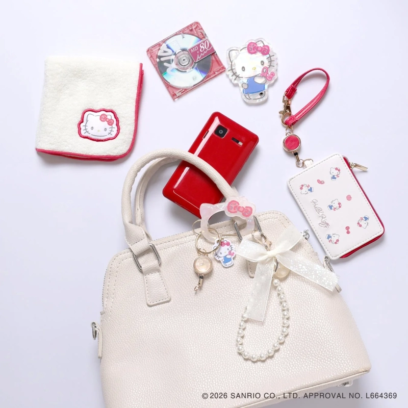 Hello Kitty with a flip phone and MD player