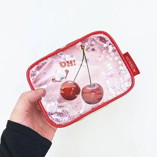 Hand holding Nonnon pouch