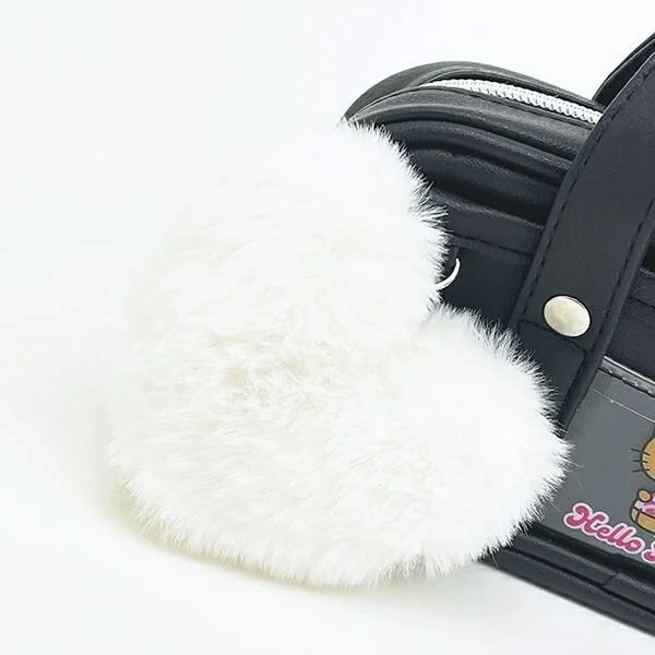 Fluffy heart charm on pen case