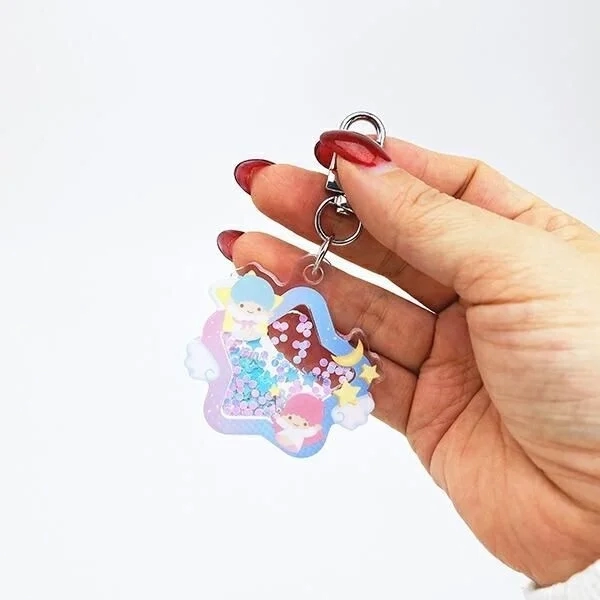 Kiki & Lala Shaker Keyholder in hand