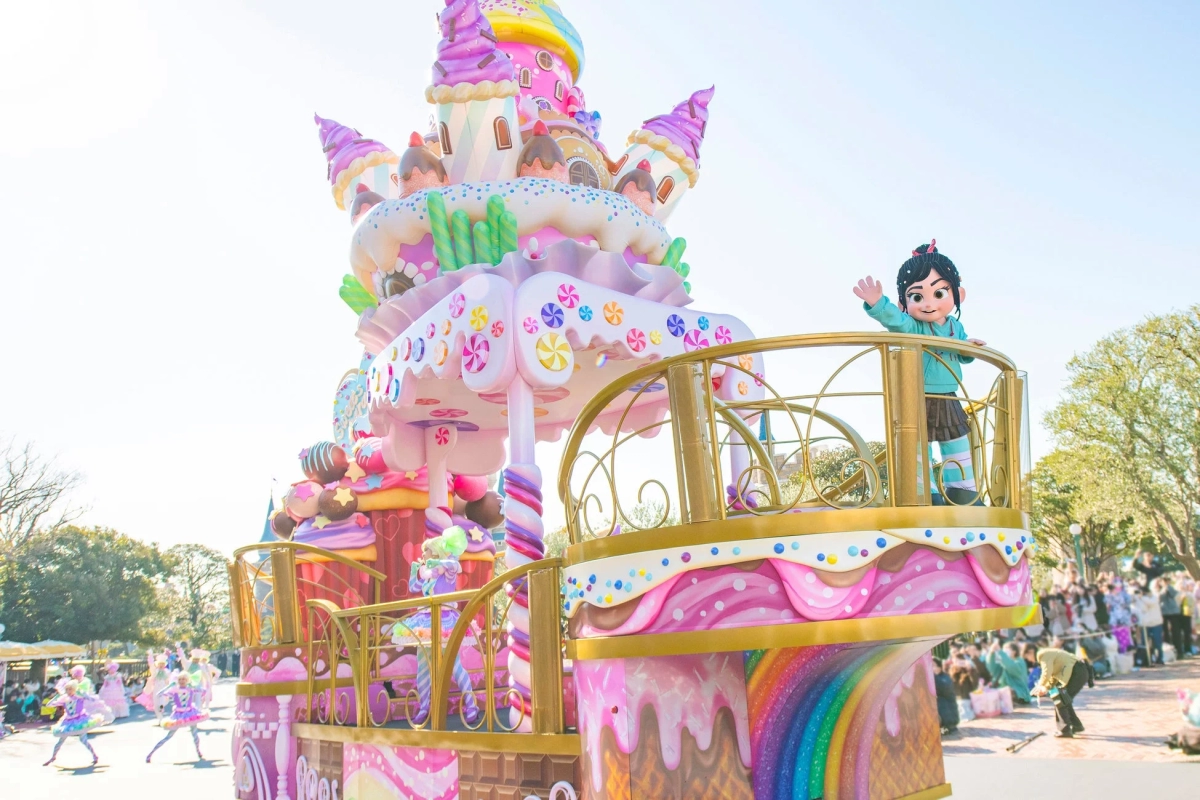 Vanellope on a colorful parade float