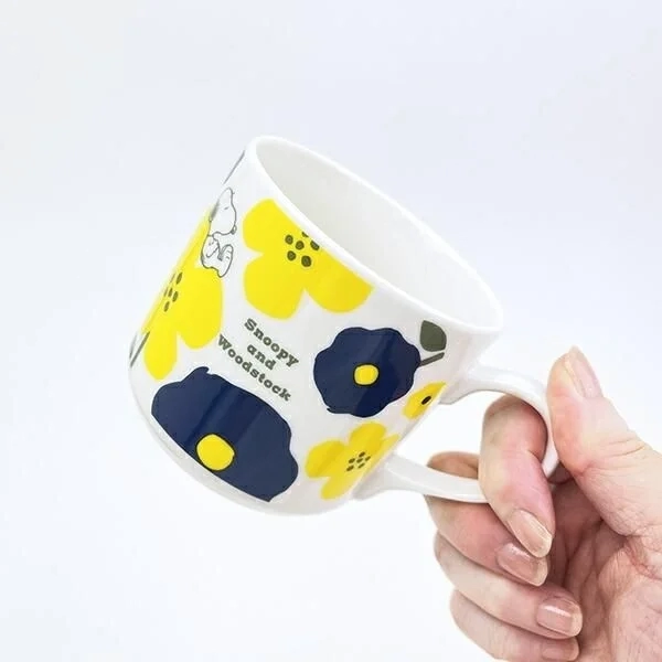 Snoopy Flower Moment Mug in hand
