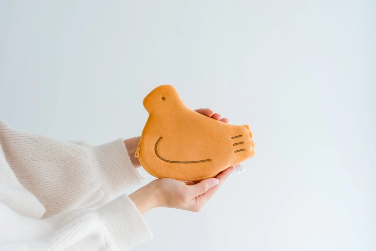 Hato Poppo Pouch held in hands