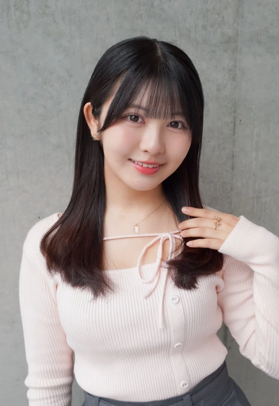 Yuna Satsuki, the voice actress for Ulala Luca, smiling warmly.