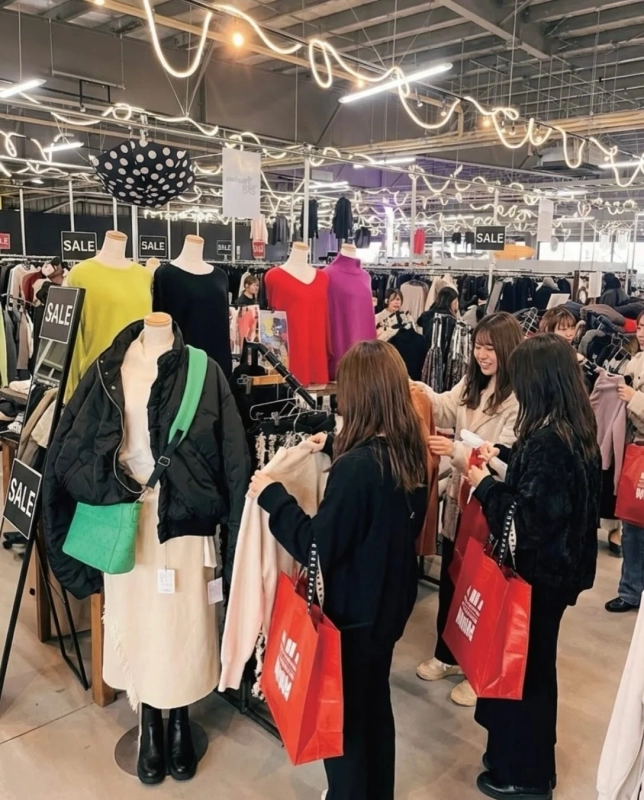 Shoppers enjoying the mall's apparel stores