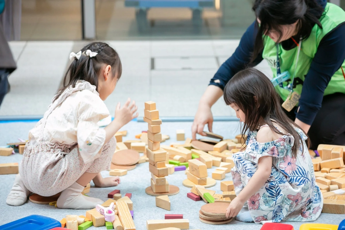 Children playing with wooden blocks