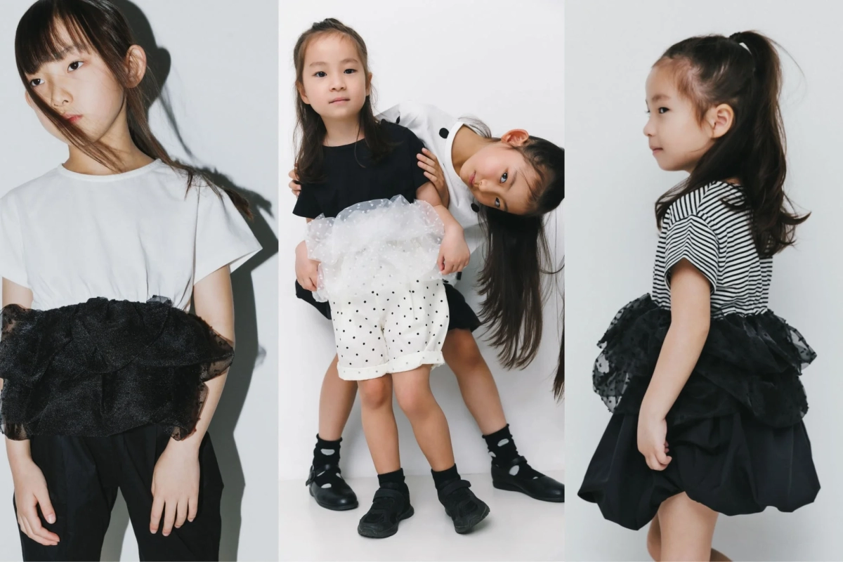 Children in modern monochrome outfits
