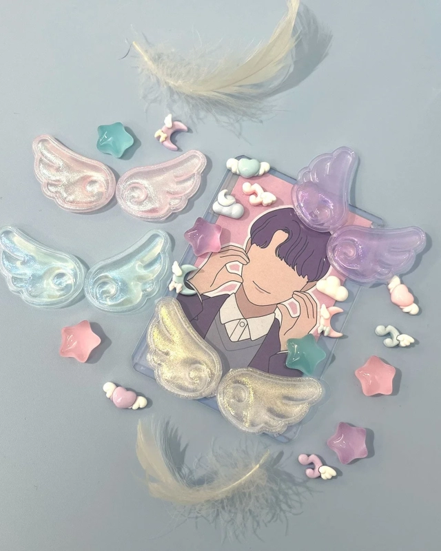 Acrylic card with anime-style male illustration and pastel-colored charms