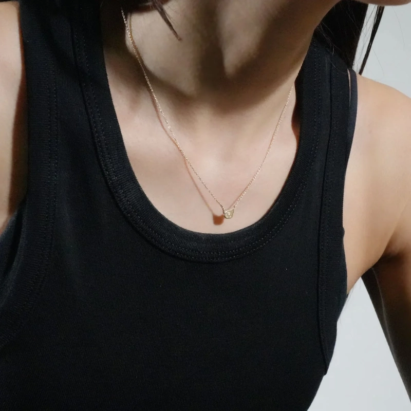 Model wearing necklace