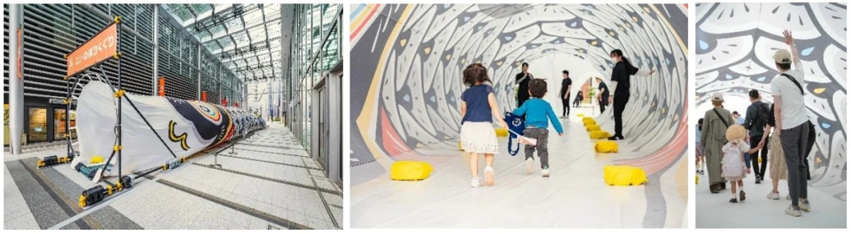 Kids interacting with Koinobori tunnel