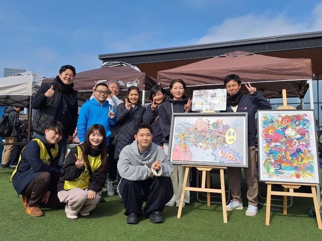 Artist MUSASHI with his artworks